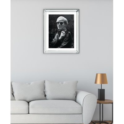 Andy Warhol In His Leather Jacket Holding His Camera - Print on Wood