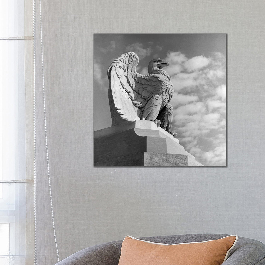 1960s Eagle Statue Against Sky Clouds Wings Spread Feathers by Vintage Images - Wrapped Canvas Print