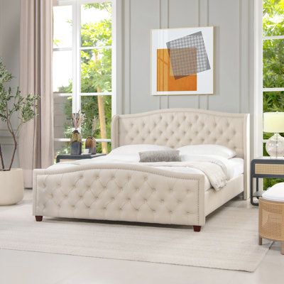 Aquilera Upholstered Wingback Bed
