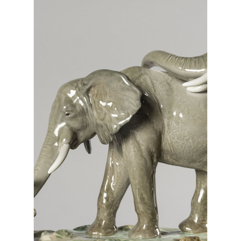 Figurine des éléphants « nous suivons vos marches »