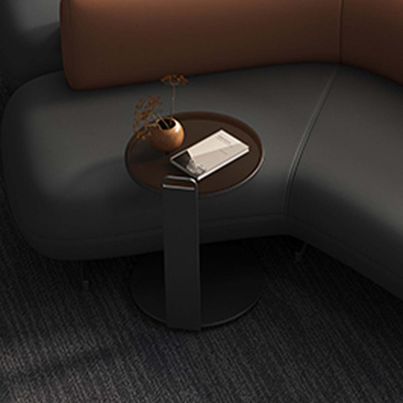 Simple round dark glass tea table