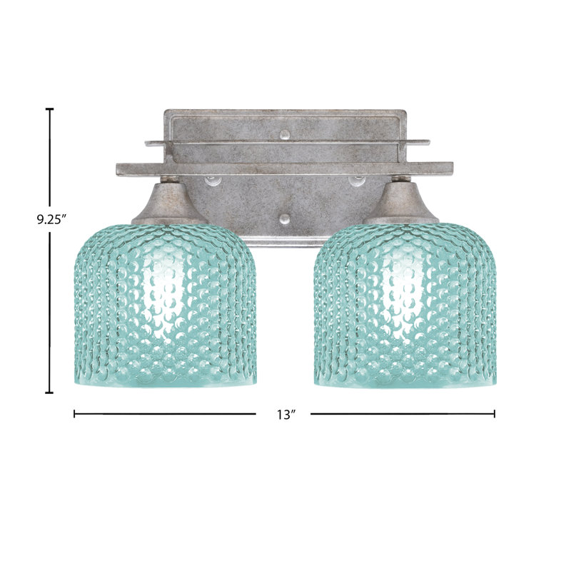 Uptowne 2 Light Bath Bar Shown In Aged Silver Finish With 6" Textured Glass, Turquoise