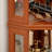 Lighted Dark Oak Corner Curio, Two Side - Hung Glass Doors, Adjustable Shelving, For Cherry Or Themed Living Spaces