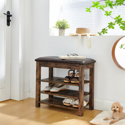 Un banc à langer réglable en hauteur en bois de haute qualité, équipé d'un siège confortable et d'un espace de rangement dissimulé, en bois grainé gris anthracite, rétro