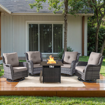 Chalsea 4 - Person Swivel Glide Chair Outdoor Seating Group with Fire Pit with Cushions by Red Barrel Studio