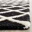 Tapis noir / blanc en laine touffeté à la main Sanyla-1627703372