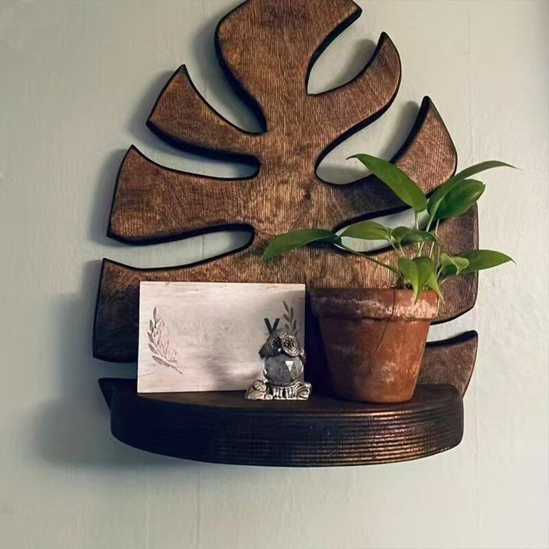 Solid wood wall-mounted shelf combining storage and decorative functions