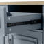 Îlot de cuisine mobile de style ferme moderne de 65 pouces avec abattant, armoire à poubelle inclinable et prise électrique-381603187
