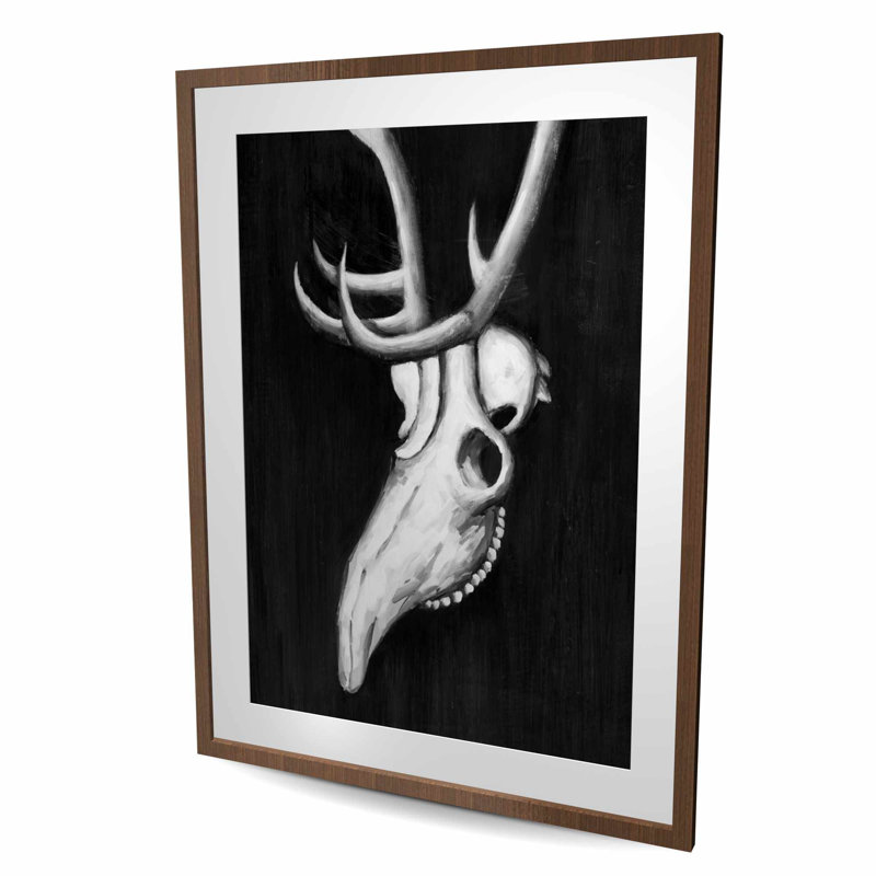 Crâne de cerf dans le noir - impression encadrée en noir et blanc
