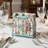 Bird Napkin Holder, Mint Green Distressed Metal Birdcage Stand with Perched Bird Accent 