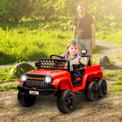 QABA 12V 4x4 Kids Ride on Truck avec remorque arrière, voiture électrique 2WD / 4WD pour enfants avec télécommande parentale, système de suspension à ressort, démarrage en douceur, musique, lumière DEL, klaxon, rouge
