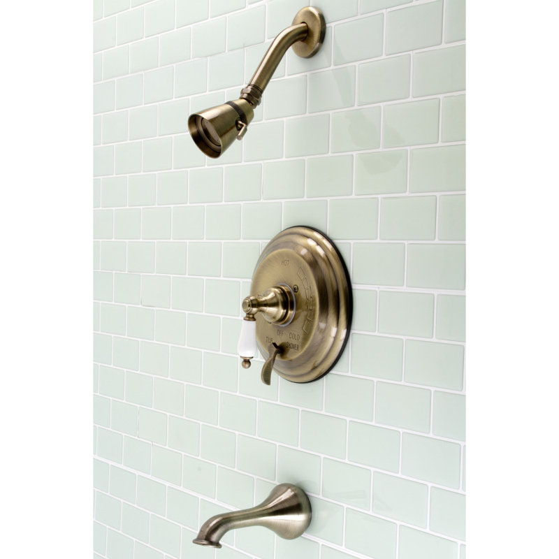 Kingston Brass Restoration Single-Handle Pressure Balanced Tub and Shower Faucet, Antique Brass