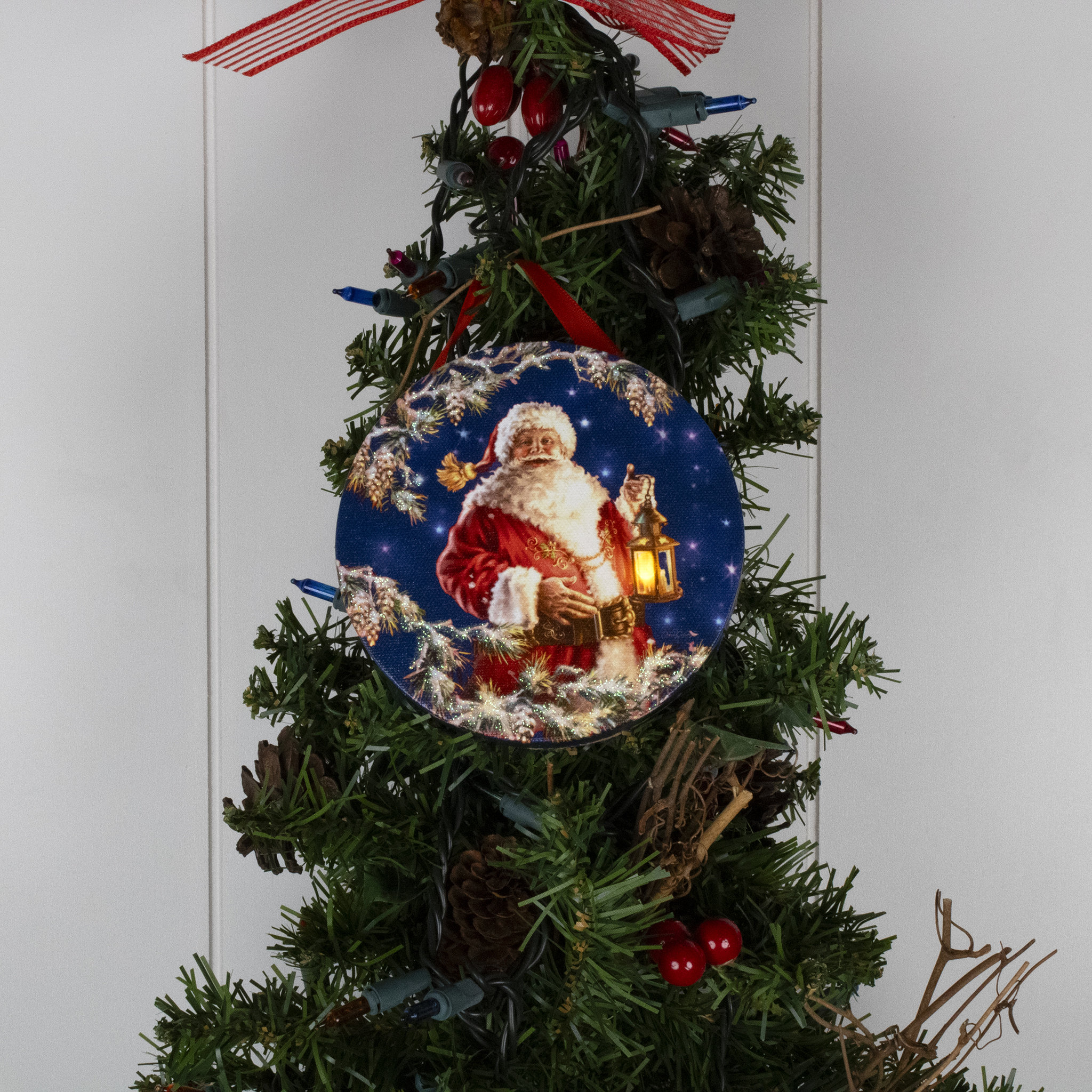 The Holiday Aisle® Fly Fishing Santa Figurine & Collectible