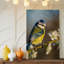 Reproduction d'art sur toile, une mésange bleue vibrante perchée gracieusement sur une branche délicate, ornée de fleurs blanches en fleurs-1074613273