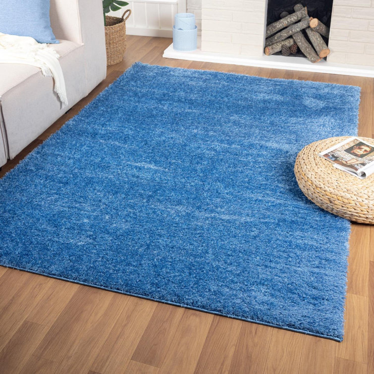 Tapis bleu uni tissé à la machine 5 pi x 7 pi