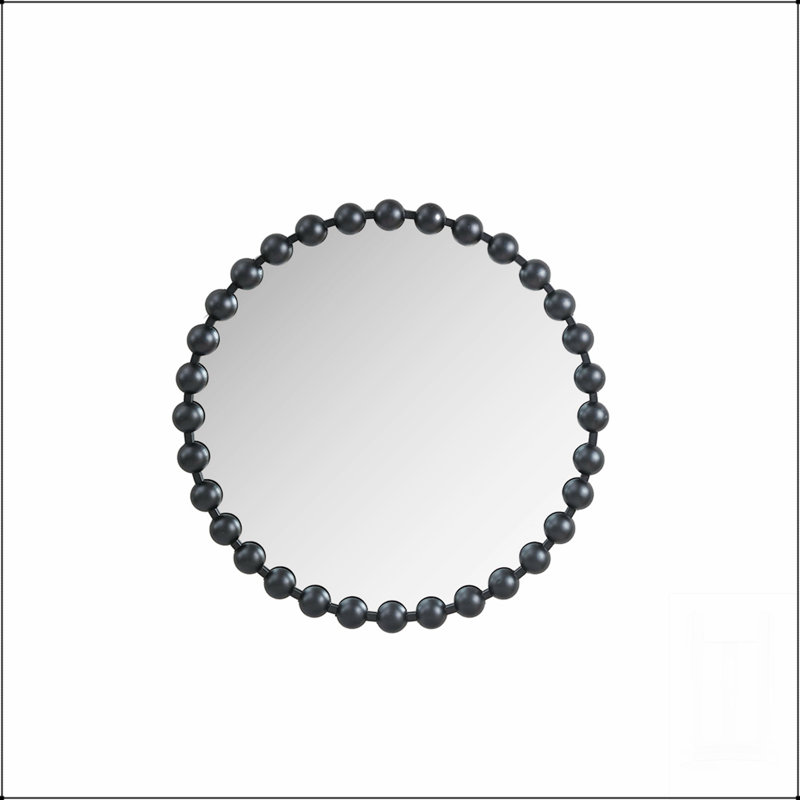 Élégant miroir mural rond perlé avec cadre noir mat, parfait pour améliorer la lumière et l'espace dans les intérieurs modernes.