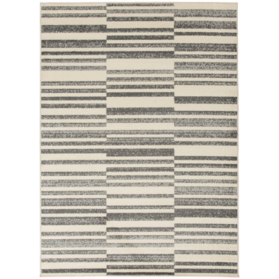 Tapis abstrait gris en polypropylène tissé à la machine Poultney