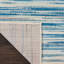 Tapis bleu abstrait tissé à la machine Poyen-1034209637