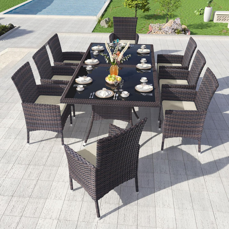 Hemraj 10-Piece Outdoor Dining Set Rattan Chairs With Cushions And Matching Glass-Top Tables, Sand