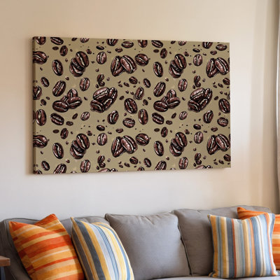 La toile crée un motif sans couture mettant en vedette un ensemble de grains de café, art mural de tailles et d'orientations variées
