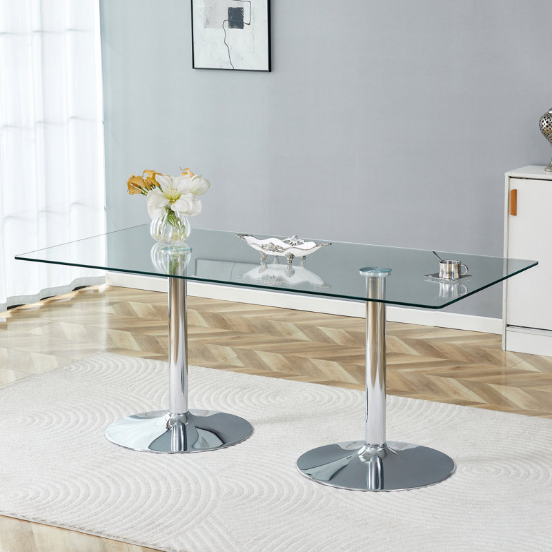Un plateau de table en verre de 71 x 35,4 pouces et une table de salle à manger circulaire minimaliste moderne avec des pieds en métal argenté électrolytique. Convient aux restaurants et aux salons.