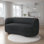 Causeuse Srey, 64 po, Boucle moderne, forme de reins courbée