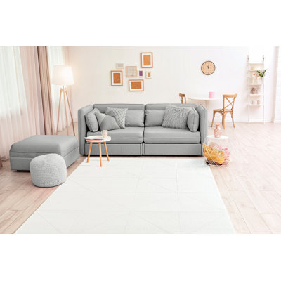 Tapis blanc avec accents Zed
