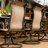 Sweeten 9 Piece Dining Set with 8 Swivel Rocker Chairs and 60 x 84 in. Table