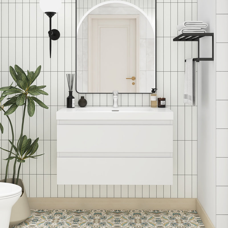 Meuble-lavabo mural de 91 cm (36 po) en panneaux de particules mélaminés blancs avec dessus en résine blanche et carbonate de calcium, deux tiroirs coulissants en forme de U à fermeture amortie, préassemblé.