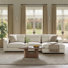 Canapé modulaire de 122,4 po avec coussins réversibles en mélange de plumes et coussin lombaire amovible.