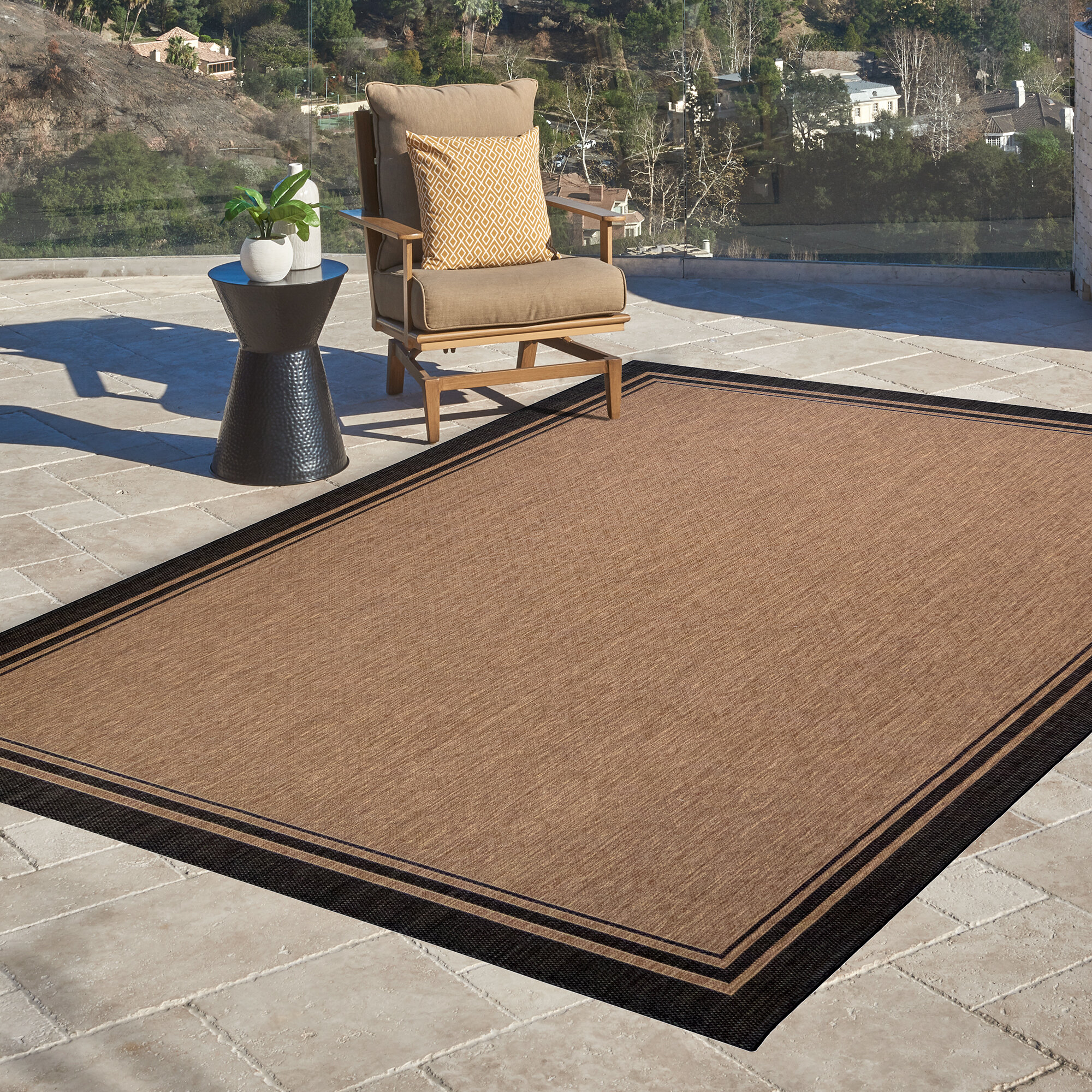 https://assets.wfcdn.com/im/32574293/compr-r85/1106/110652899/gertmenian-paseo-soroa-classic-border-indooroutdoor-flatweave-area-rug.jpg