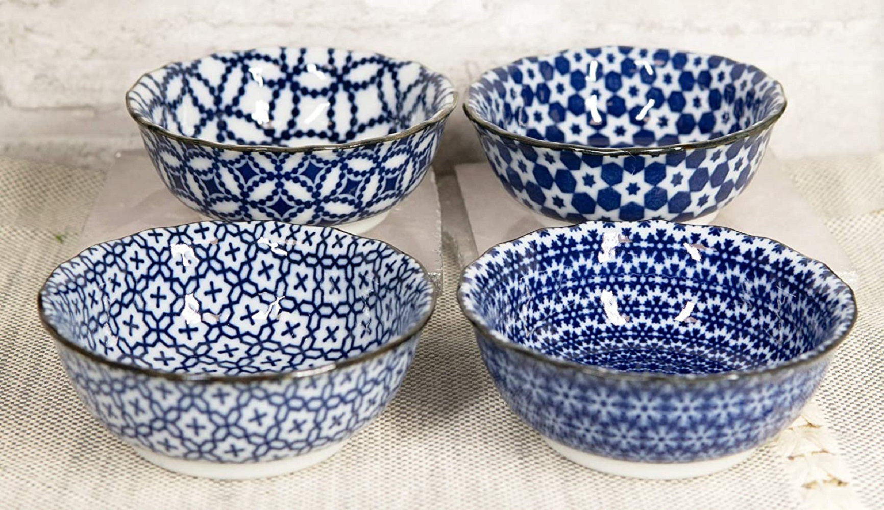 https://assets.wfcdn.com/im/32584710/compr-r85/2162/216237955/red-barrel-studio-made-in-japan-pack-of-4-blue-and-white-multi-geometric-pattern-ceramic-sauce-condiment-ap.jpg