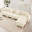 Canapé modulaire en L convertible en L pour 4 personnes avec accoudoirs en forme de coquillage, repose-pieds amovible et pieds cylindriques Boucle