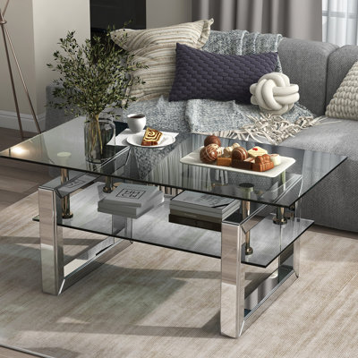 Table basse rectangulaire en verre avec tablette pour clavier - Hauteur réglable manuellement pour s'adapter à différentes pièces - Structure en métal argenté - Rangement ouvert - Confort d'utilisation