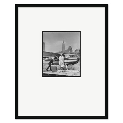Vogue Magazine, "Woman By A Seaplane", John Rawlings, May 15, 1954 Print