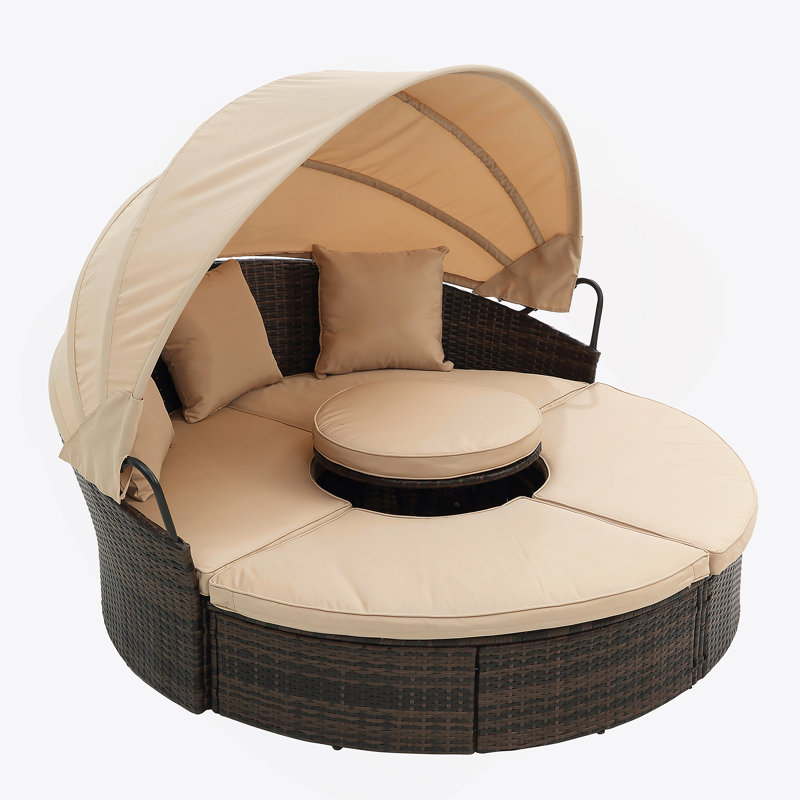 Canapé-lit d'extérieur rond en rotin avec auvent et table basse relevable