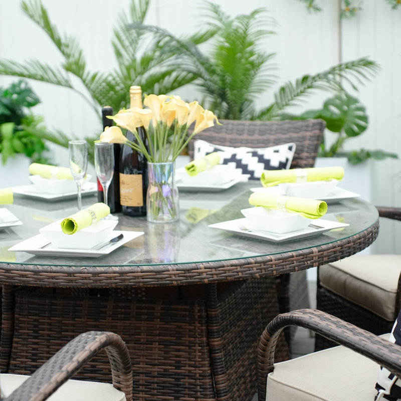 Artherine 6 - Person Wicker Patio Dining Set with Round Table , Cushions Included, Brown/Beige
