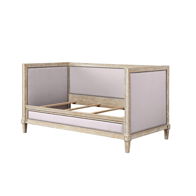 Lit de jour rembourré en lin beige avec détails en chêne vieilli