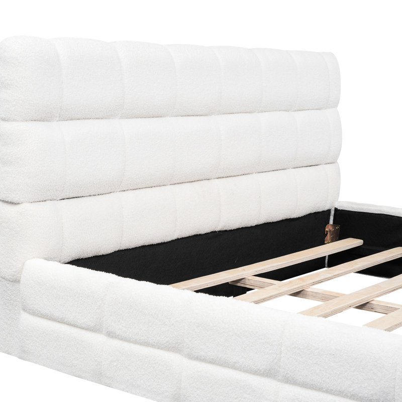 Luxueux lit plateforme tapissier avec tête de lit confortable et fabrication robuste, assurant une expérience de sommeil reposante et élégante.