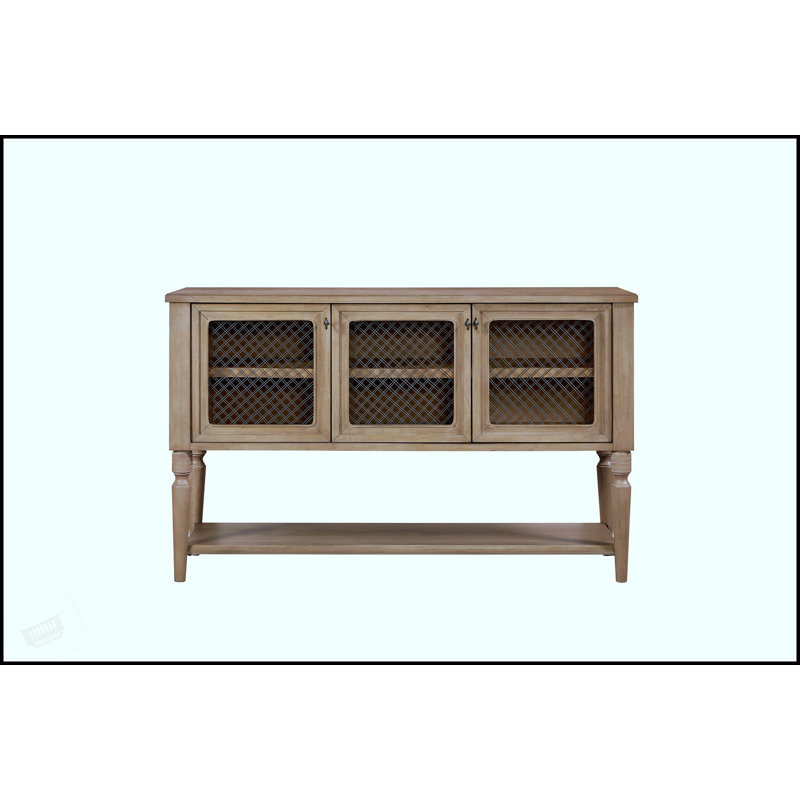 Desserte élégante avec façades de porte en maille décorative en métal, pour des espaces de vie modernes et aérés.