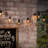 Decorative 10-Light Solar Metal Teardrop Cage String Lights – 6-Foot Industrial Black Outdoor Lighting with Warm White LED Bulbs