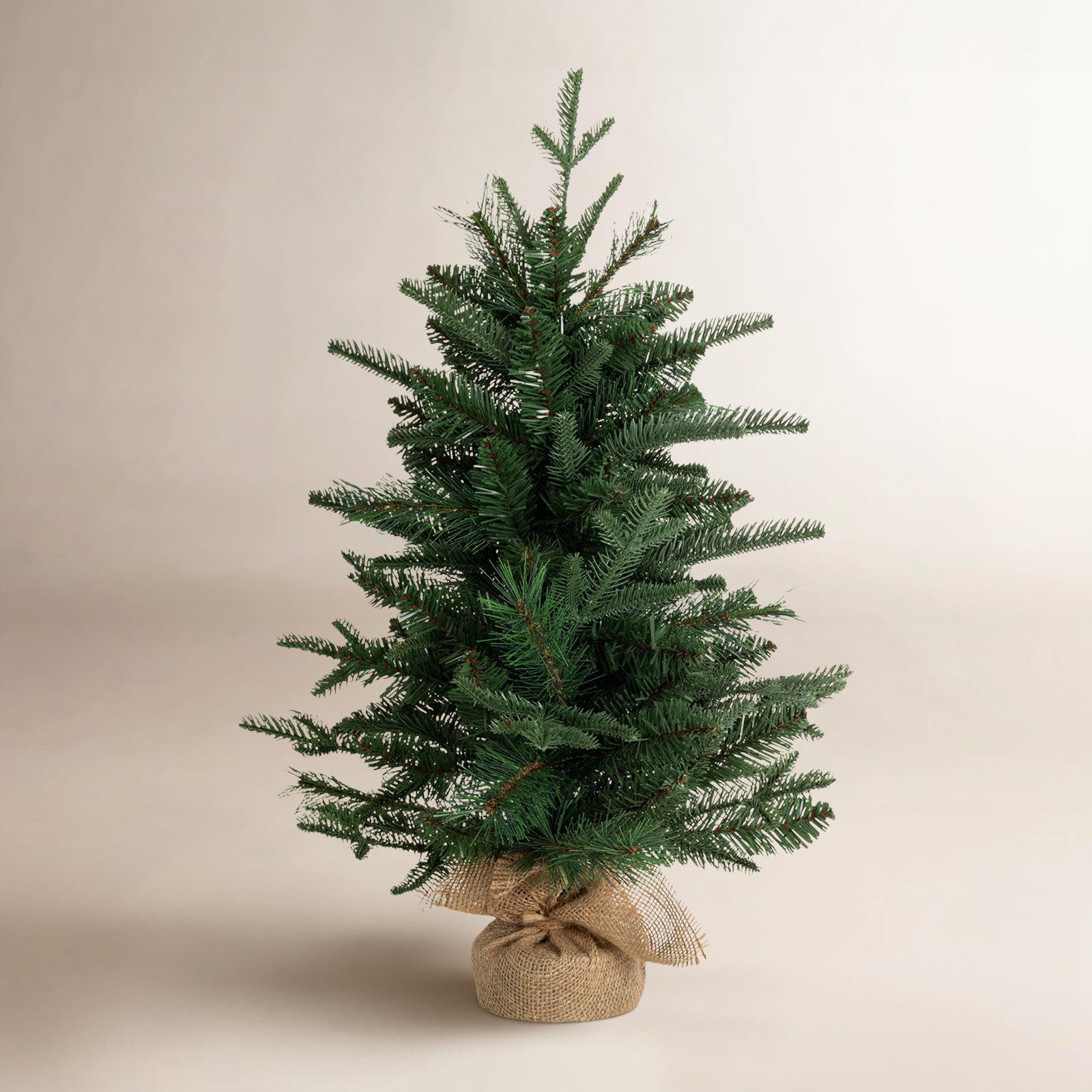 Stroud 24'' Faux Pine Tree in Wicker/Rattan Pot