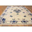 Tapis chinois antique en laine nouée de style rectangulaire ivoire des années 1890