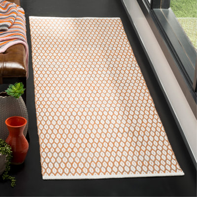 Tapis orange / ivoire en coton tissé à plat Modena