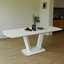 Table de salle à manger extensible en blanc gris antique, pieds en forme de U, convenant à la cuisine et au salon, capacité de 2 à 8 personnes 62,27 78,74 pouces blanc avec poignée facile à pousser