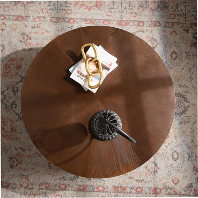 Handcrafted Round Coffee Table With Relief Design, Sturdy Pedestal, And Real Bark Texture Veneer, Ideal For Living Room