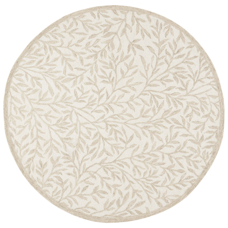 Handmade Round Ivory and Beige Floral Wool Area Rug