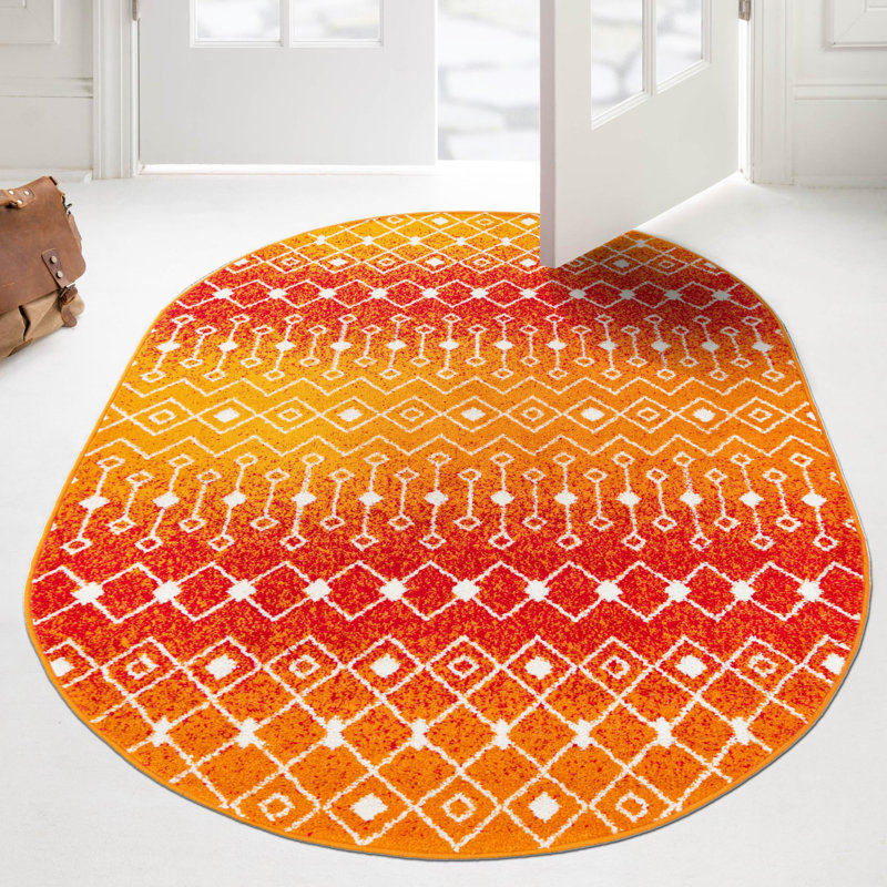 Tapis orange / rouge en polypropylène tissé à la machine Briehn, Ovale 5 pi 3 po x 8 pi