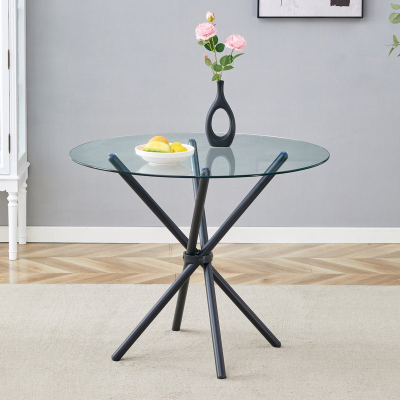 Une table ronde circulaire en verre trempé transparent d'un diamètre de 36,6 pouces