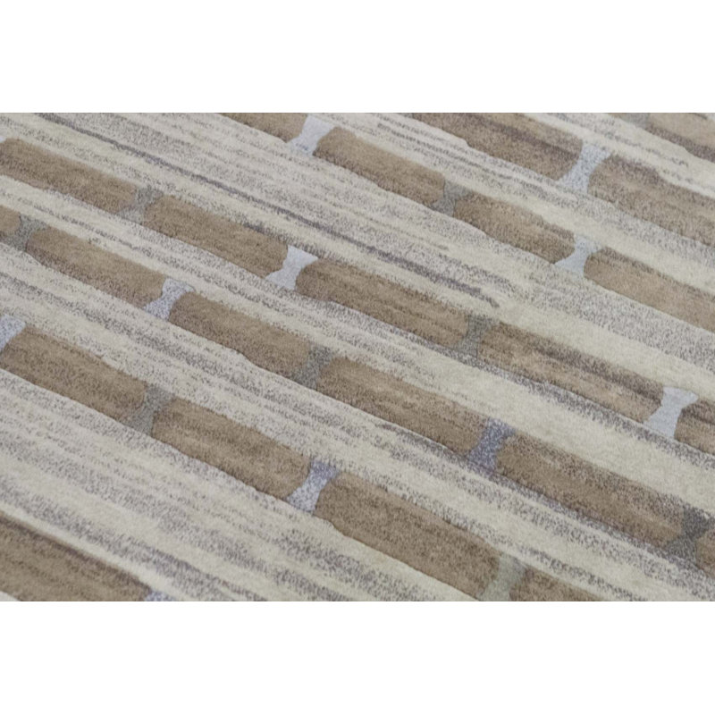 Tapis doré et crème de haute qualité noué à la main